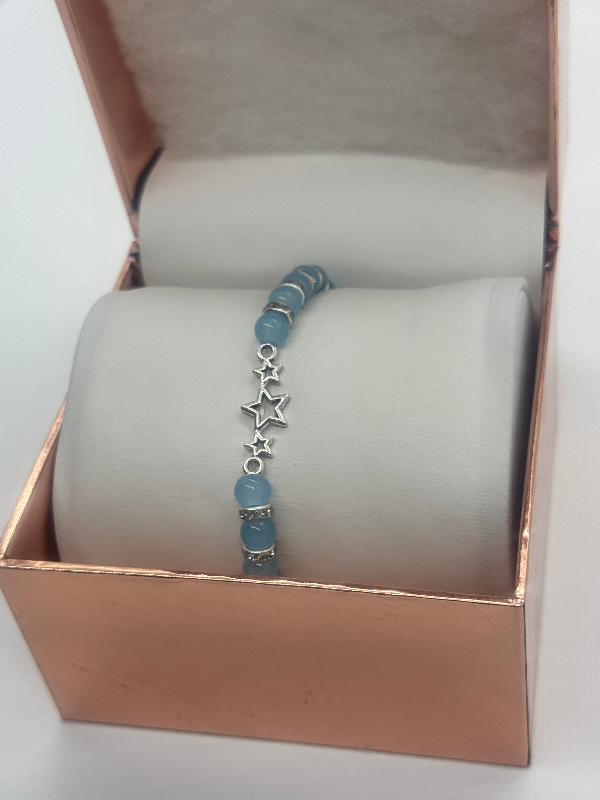 Charm Bracelet #161 – Sky Blue Beads with Silver Star Charm