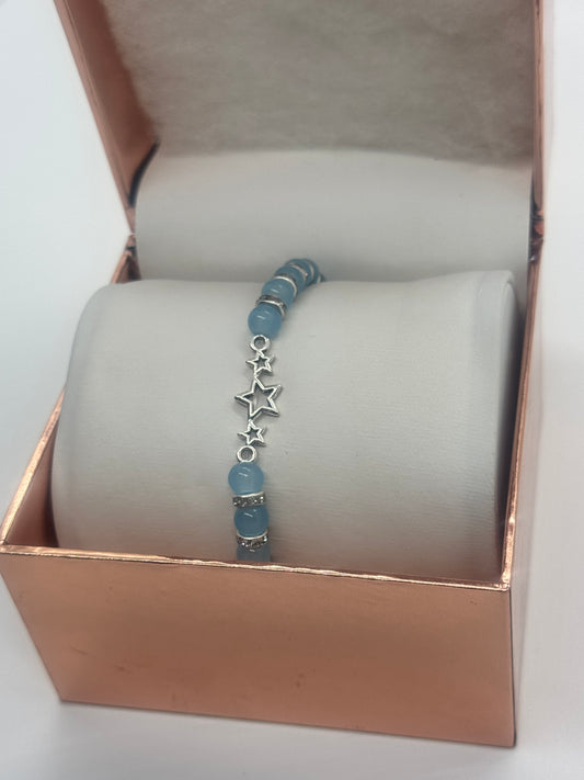 Charm Bracelet #161 – Sky Blue Beads with Silver Star Charm