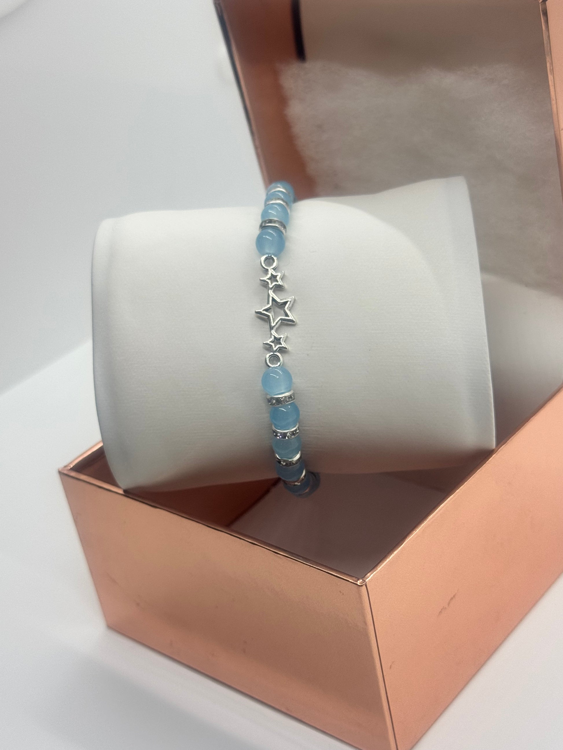 Charm Bracelet #161 – Sky Blue Beads with Silver Star Charm